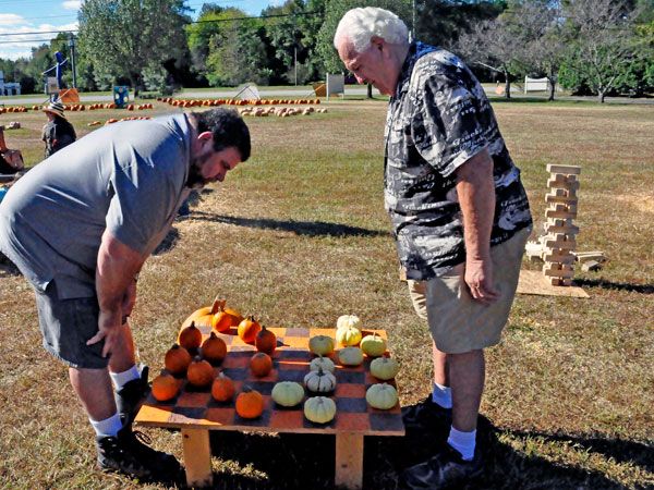 Lee & John play pumpkin checkers